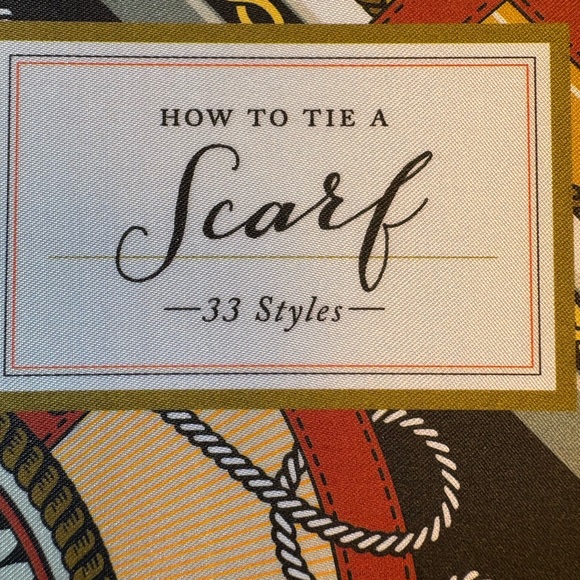 How To Tie A Scarf book with a beautiful scarf and a scarf hanger. - Picture 9 of 11